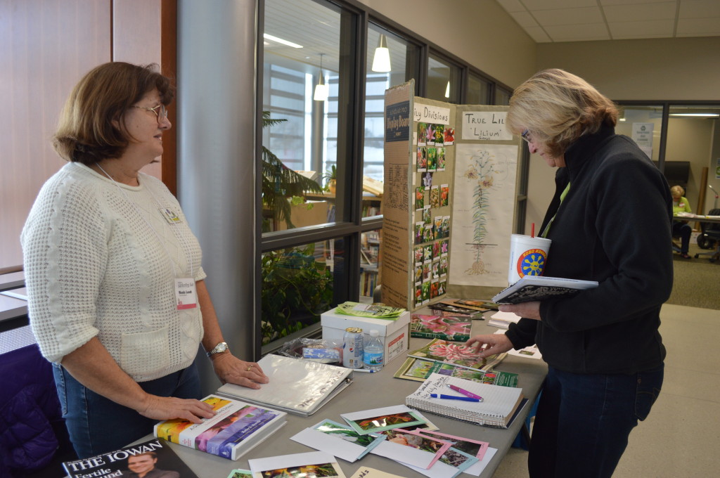 Wanda Lunn of Cedar Rapids provided information on growing iris at the Winter Gardening Fair at Kirkwood. (photo/Cindy Hadish)