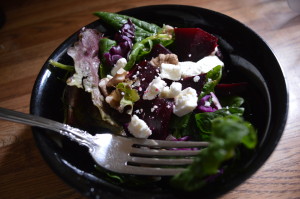 Locally grown lettuce, spinach, beets and walnuts combined for a fresh salad in the midst of Iowa's cold. (photo/Cindy Hadish) 