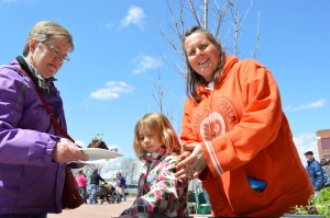Sonia Kendrick volunteers at last year's EcoFest in Cedar Rapids, Iowa. She is one of 10 "Champions of Change" to be honored by the White House on March 25, 2014. (photo/Cindy Hadish)