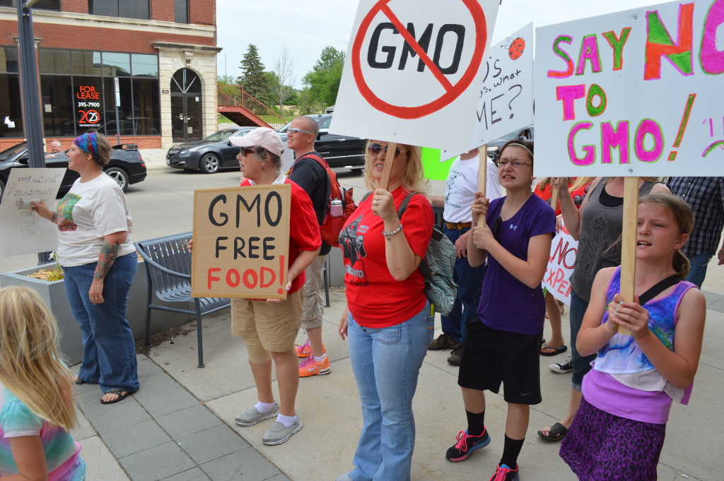 Activists gather in New Bohemia in Cedar Rapids during the global March Against Monsanto on Saturday, May 23, 2015. (photo/Cindy Hadish)
