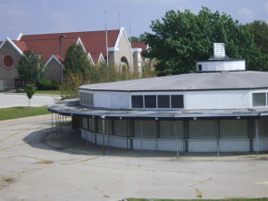 The Riverside Roundhouse is shown after the 2008 flood and before it was dismantled to make way for a new location for the National Czech & Slovak Museum & Library, seen in the background. (photo/Cindy Hadish)