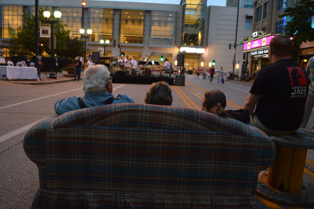 Couches provided a cozy place to watch bands perform during the first Market After Dark in downtown Cedar Rapids. (photo/Cindy Hadish)