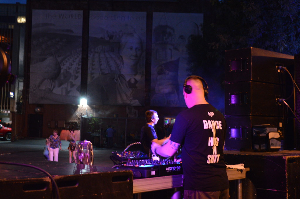 A DJ plays tunes next to Guaranty Bank in downtown Cedar Rapids during the first Market After Dark. (photo/Cindy Hadish)