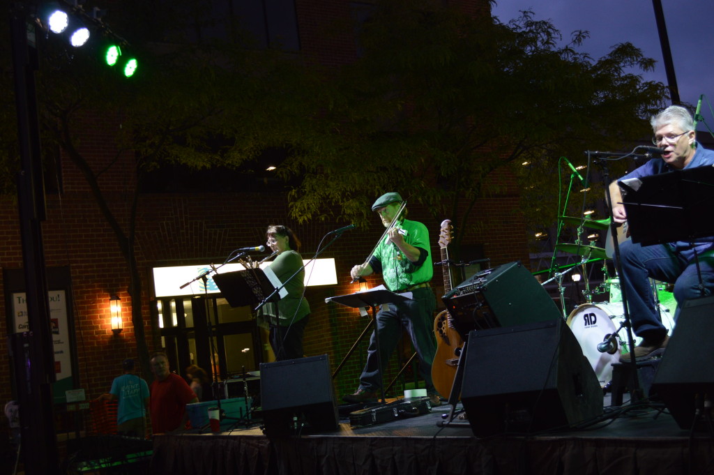 Irish Jam entertains the crowd on the main stage Saturday, Aug. 29, 2015, during Market After Dark. (photo/Cindy Hadish)