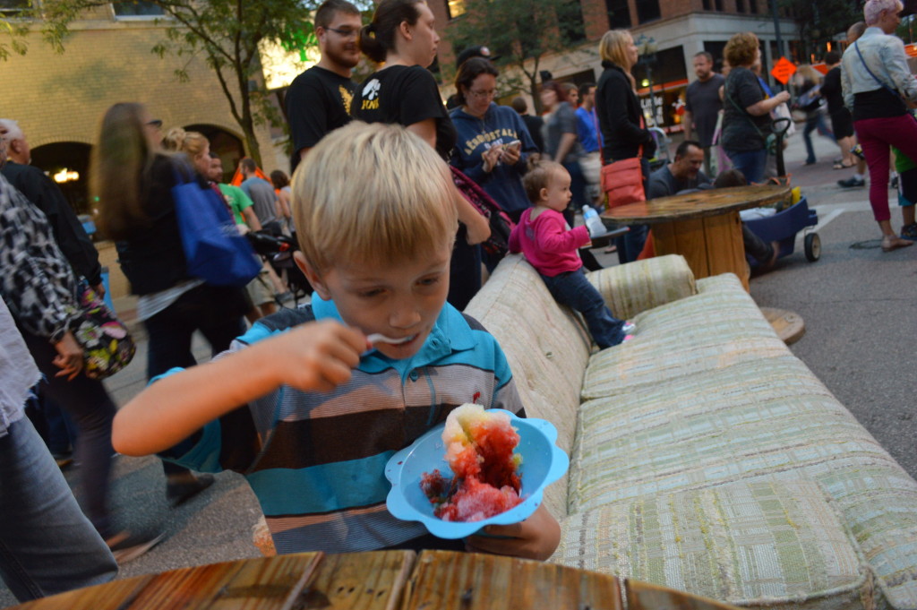 Children found plenty to eat at the first Market After Dark in downtown Cedar Rapids. (photo/Cindy Hadish)