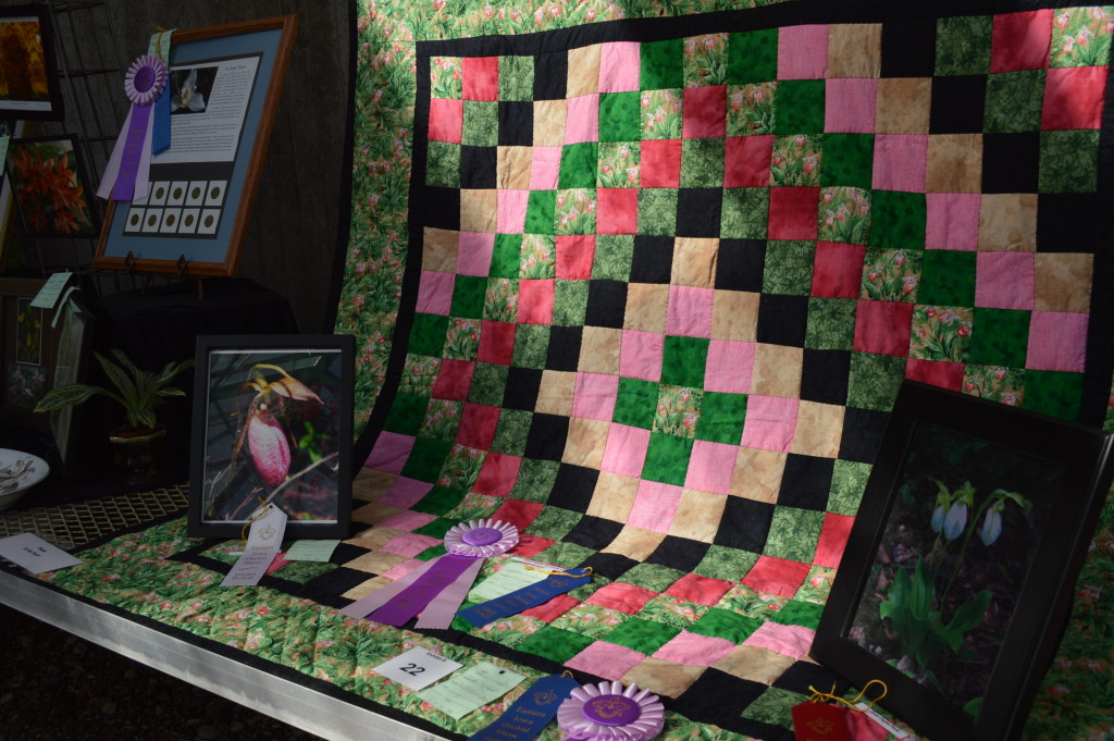 Lois and Nile Dusdieker also included a colorful orchid quilt in their award-winning display. (photo/Cindy Hadish) 