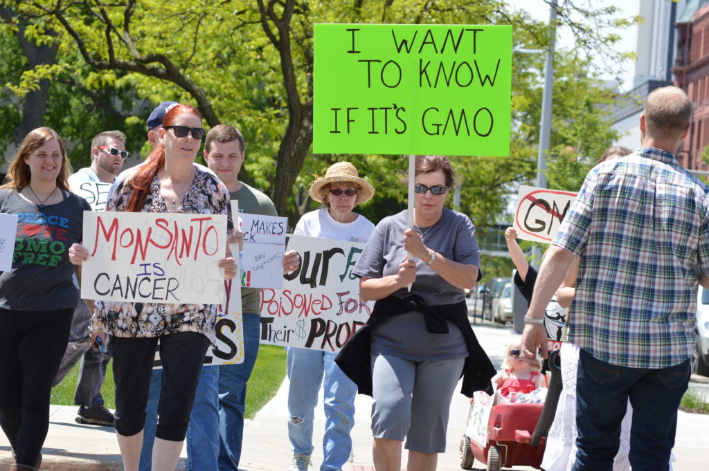 Activists begin a March Against Monsanto in downtown Cedar Rapids on Saturday, May 21, 2016. (photo/Cindy Hadish)