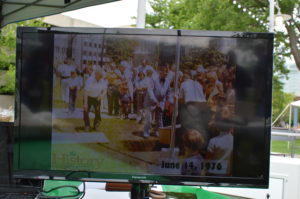 Images of the burial of the time capsule were shown during the May 20 event. (photo/Cindy Hadish)