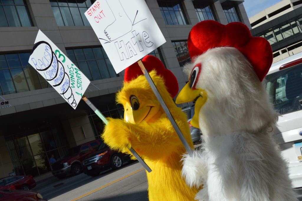 The rally against Donald Trump even brought out protesters in chicken costumes in the summer's heat on July 28, 2016. (photo/Cindy Hadish)