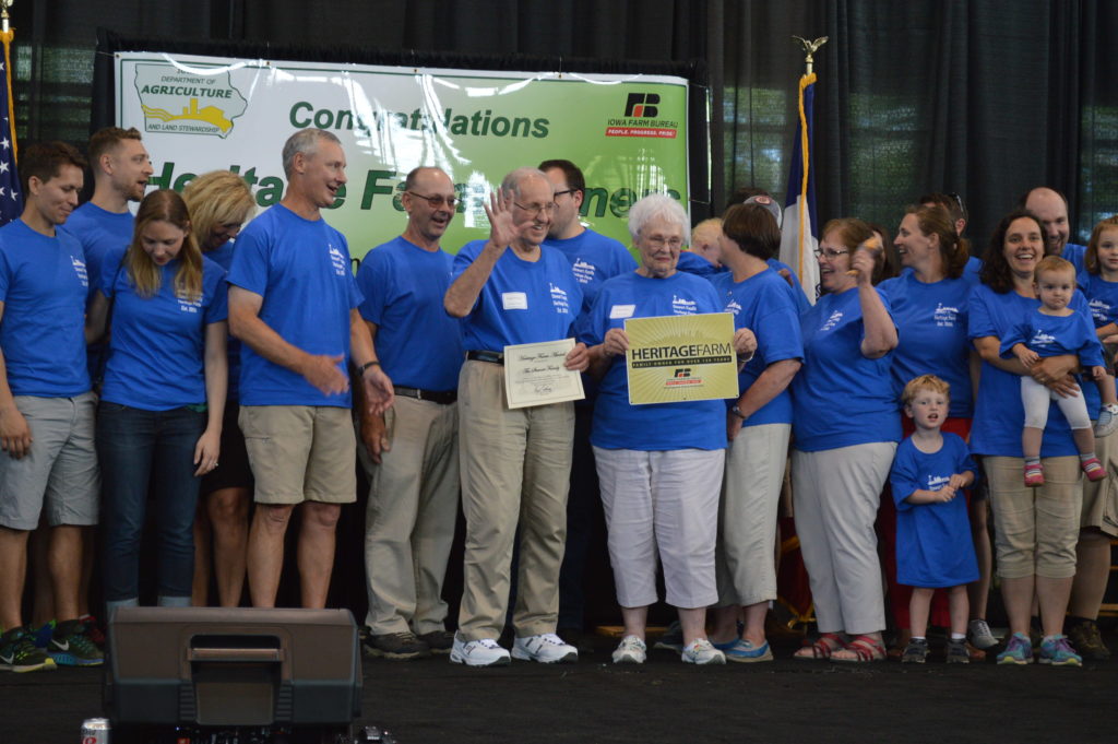 The Stewart family, from Jackson County, Iowa, received its Heritage Farm award at the Iowa State Fair on Aug. 18, 2016, with representatives from the east and west coasts and as far as New Zealand. (photo/Cindy Hadish)
