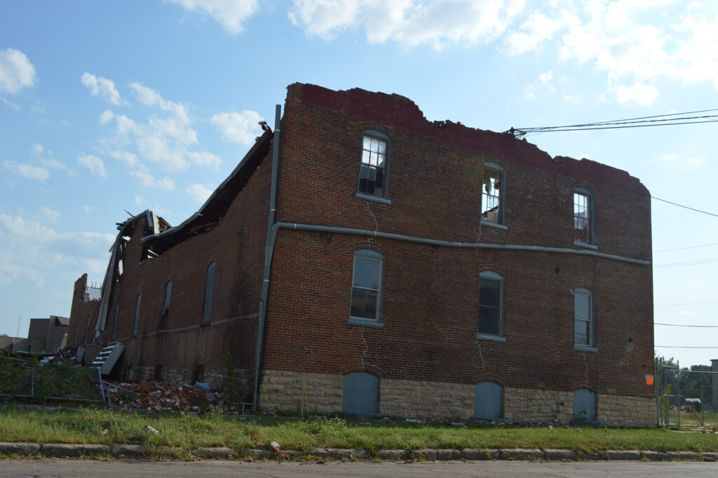 The two-story Chandler Pump Co. building is seen after the August 2020 derecho in Cedar Rapids, Iowa. (photo/Cindy Hadish)